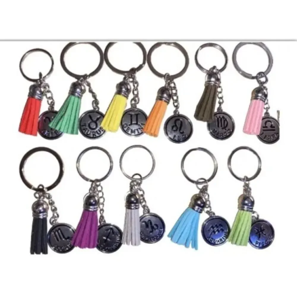 ☀️3/$9☀️ Gemini Keychain with Yellow Tassel